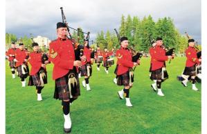 The RCMP Pipe Band played as the sun shines. Photograph by: Russ Samson, for North Shore News